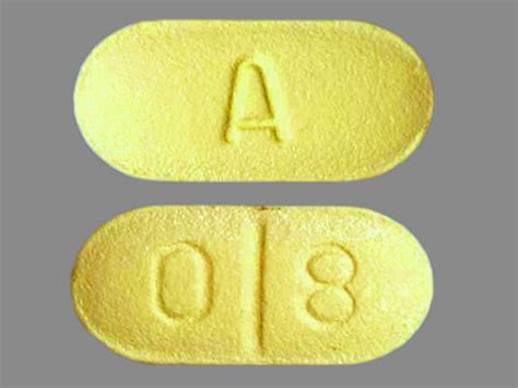 ) Color. . Yellow oval pill a 80